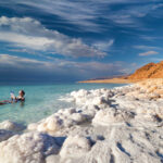 soak in the dead sea or walk the calcite cliff in turkey here are the best wellness getaways